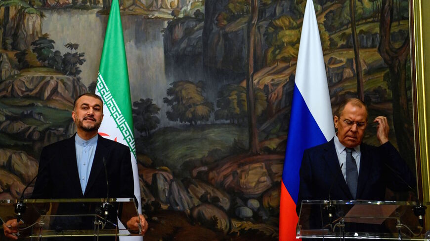 Russian Foreign Minister Sergei Lavrov (R) and his Iranian counterpart Hossein Amir-Abdollahian hold a joint press conference following their meeting in Moscow on Oct. 6, 2021. 