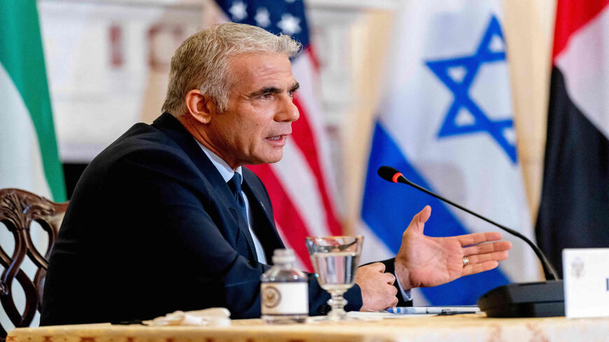 Israeli Foreign Minister Yair Lapid appears during a joint news conference with US Secretary of State Antony Blinken and United Arab Emirates Foreign Minister Sheikh Abdullah bin Zayed Al Nahyan at the State Department in Washington, Oct. 13, 2021.
