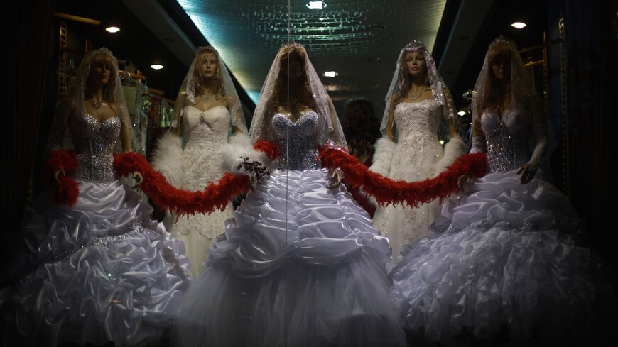 Mannequins display wedding gowns designed by the al-Ashi family at their atelier in Gaza City on June 3, 2013. 