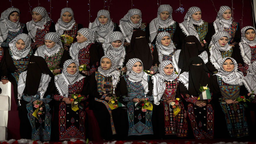 Palestinian brides are seen during a mass wedding ceremony, Gaza City, Gaza Strip, Feb. 4, 2014. 