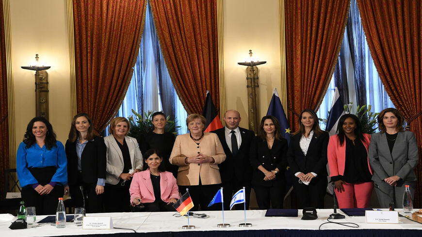 German Chancellor Angela Merkel meet with Israeli Prime Minister Naftali Bennett and the female ministers of the Israeli Cabinet, Jerusalem, Oct. 10 2021.