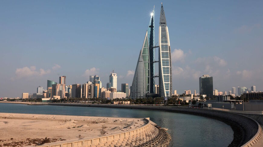 A picture taken on Dec. 3, 2020, shows the world trade centre (R) and the skyline of the Bahraini capital Manama. 