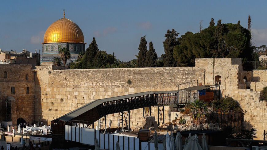 This picture shows the Mughrabi ramp, leading from the Western Wall (Wailing Wall) to the Al-Aqsa Mosque compound that includes the Dome of the Rock Mosque (background) in Jerusalem's Old City, on Sept. 10, 2021. 