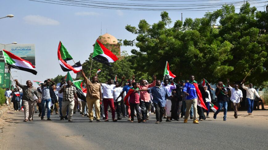 Sudanese anti-coup protesters attend a gathering in the capital Khartoum's twin city of Omdurman on Oct. 30, 2021.