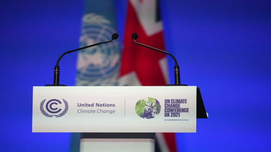 The podium is seen ahead of the start of COP26 on Oct. 31, 2021, in Glasgow, Scotland.