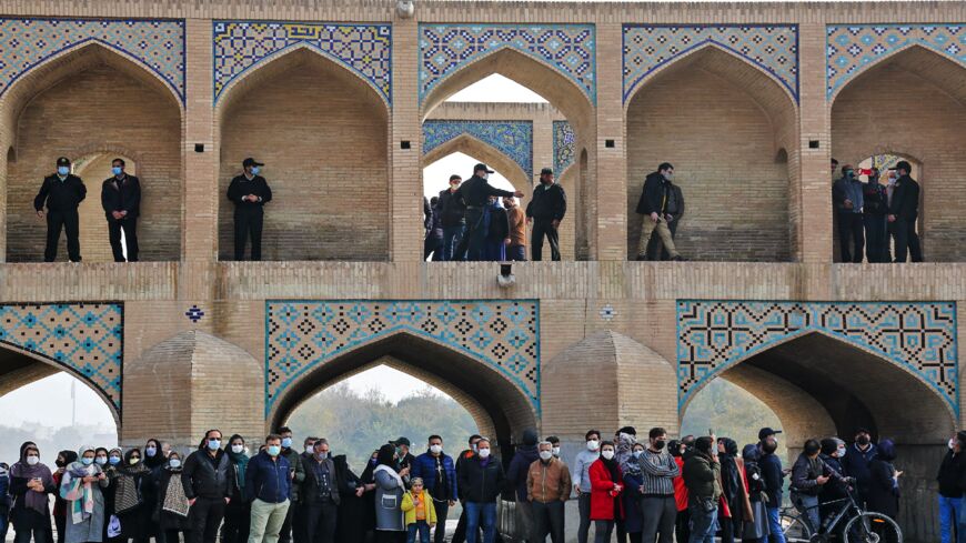 Iranians gather during a protest to voice their anger after their province's lifeblood river dried up due to drought and diversion, in the central city of Isfahan, on Nov. 19, 2021.