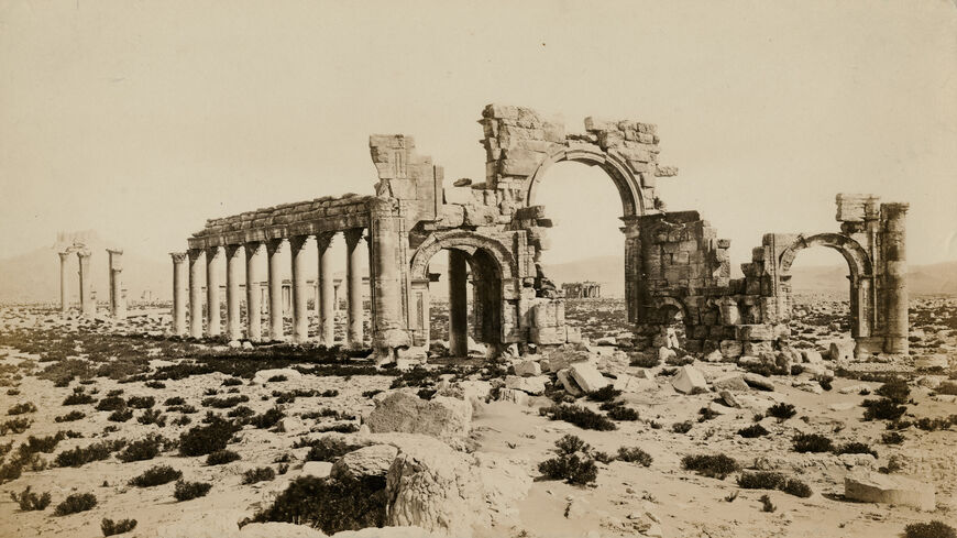 The Arc of Triumph in the ancient city of Palmyra, Syria, circa 1880.