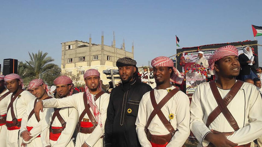 Ahmed Saleh and Al-Badia band performing the Palestinian dabkeh and daha during a show held by the Tarabin Bedouin tribe, al-Maghazi area in the central Gaza Strip, April 2021.