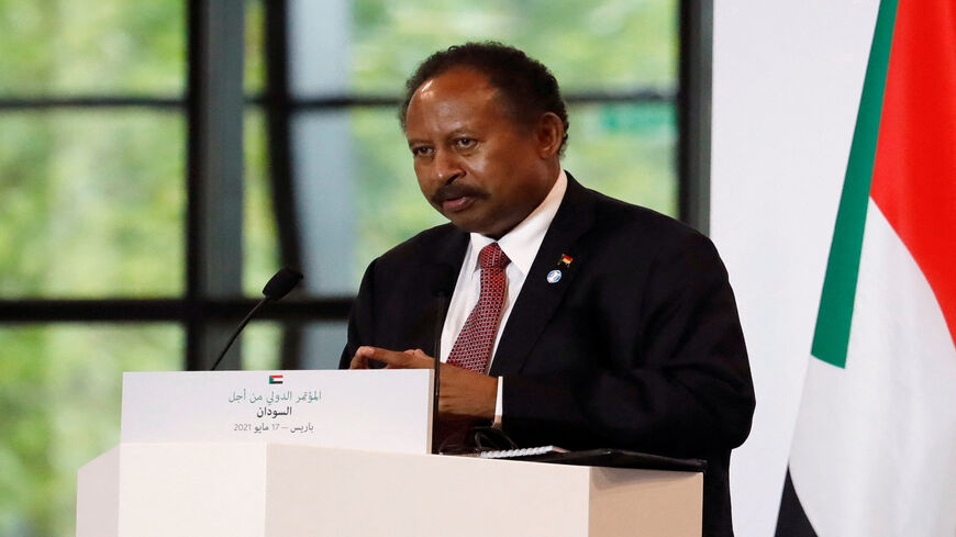 Sudanese Prime Minister Abdalla Hamdok gives a press conference with the French president and the Sudanese prime minister during the International Conference in support of Sudan at the temporary Grand Palais in Paris, France, May 17, 2021.