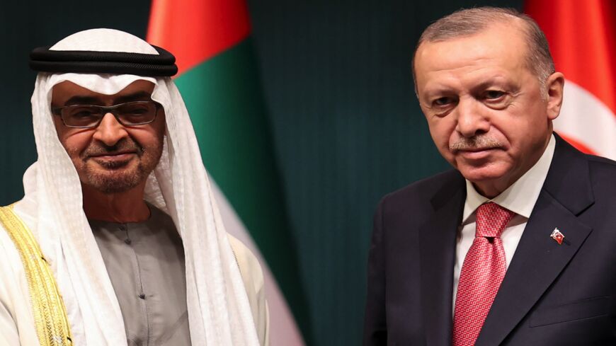 Turkish President Recep Tayyip Erdogan (R) and Abu Dhabi's Crown Prince Sheikh Mohammed bin Zayed Al Nahyan pose on Nov. 21, 2021, at the Presidential Complex in Ankara.