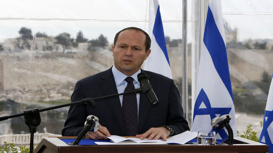 Backdropped by Jerusalem's Old City Ottoman walls, the city's Mayor Nir Barkat speaks during a joint press conference with Israeli Prime Minister Benjamin Netanyahu (unseen), Feb. 23, 2015.