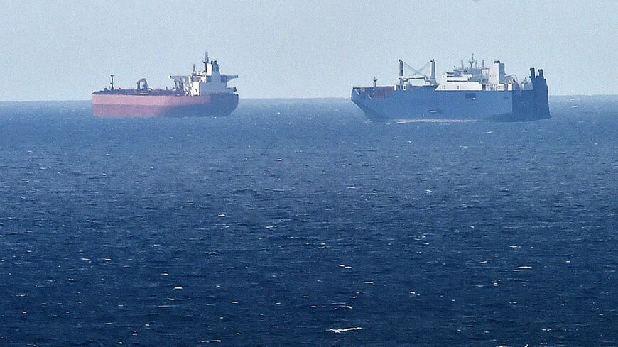 A picture taken May 9, 2019, from northern port of Le Havre, shows a Saudi cargo ship next to a British crude oil tanker in the port of Le Havre.