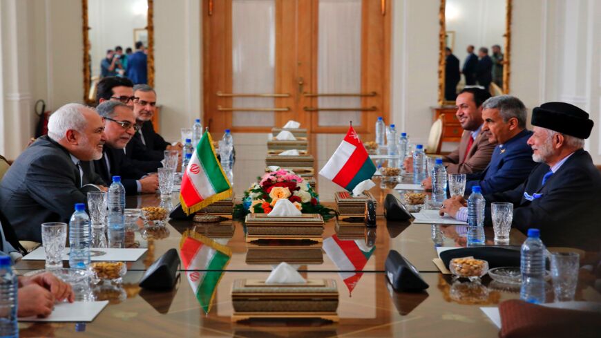 Iran's Foreign Minister Mohammad Javad Zarif (L) meets with Oman's Minister of State for Foreign Affairs Yusuf bin Alawi bin Abdullah (R) in Tehran on Dec. 2, 2019.