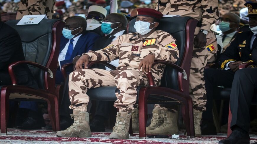 Mahamat Idriss Deby (C) sits in the honor tribune during the state funeral for his father, Chadian President Idriss Deby, in N'Djamena, on April 23, 2021.