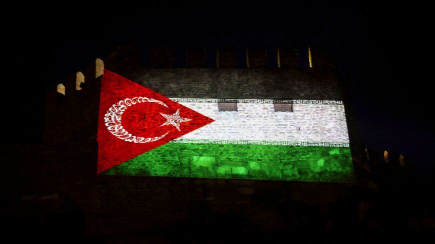 This photograph taken on May 14, 2014, shows a Gaza-Turkey solidarity flag projected on a wall of Ankara Castle in Ankara.