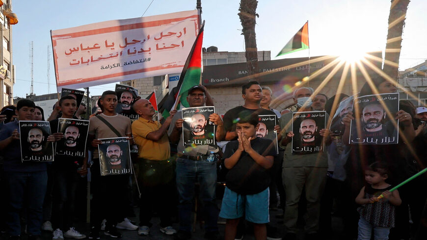 Palestinians rally to denounce the Palestinian Authority following the violent arrest and death in custody of activist Nizar Banat, Ramallah, the West Bank, Aug. 2, 2021.