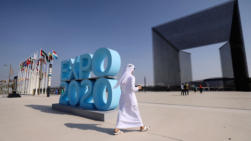 A picture shows an Emirati man walking at the Dubai Expo 2020, on Oct. 1, 2021. 