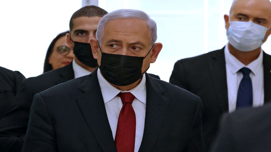 Former Israeli Prime Minister Benjamin Netanyahu leaves a Jerusalem courthouse on Nov. 16, 2021.