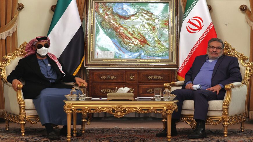 Ali Shamkhani (R) meets with Sheikh Tahnoun bin Zayed Al Nahyan in Tehran on Dec. 6, 2021.