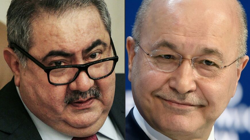 Iraqi ex-foreign minister Hoshyar Zebari (L) and President Barham Saleh 