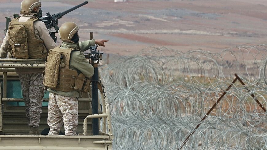 Jordanian soldiers patrol the border with Syria after stepped up drug smuggling operations which the army says are becoming "organised"