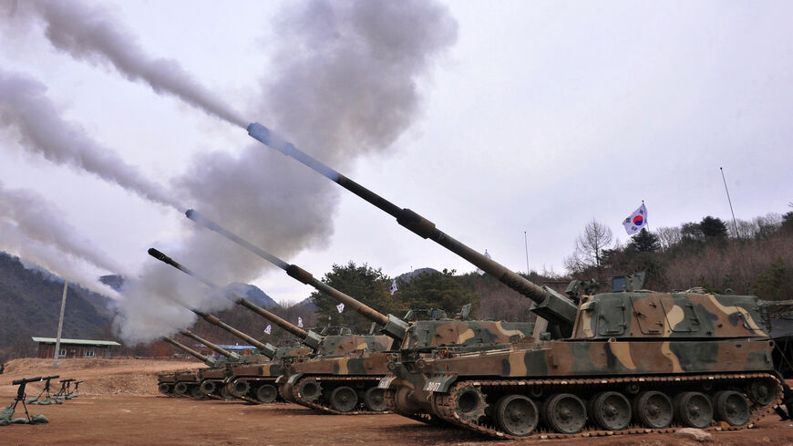 South Korean army K9 Thunder 155mm self-propelled howitzers fire during a live-fire drill in Pocheon, northeast of Seoul, South Korea, March 24, 2011.