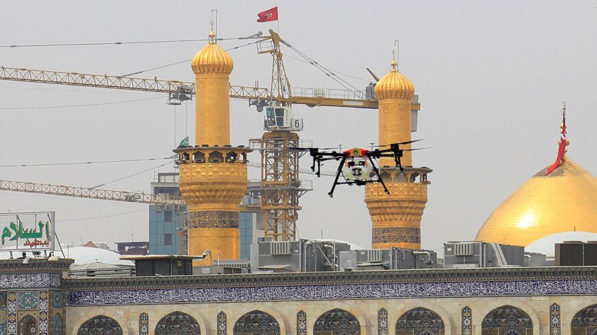 This picture taken on March 15, 2020, shows a drone being used by Iraqi health workers around the Imam Hussein Shrine in the central Iraqi holy shrine city of Karbala.