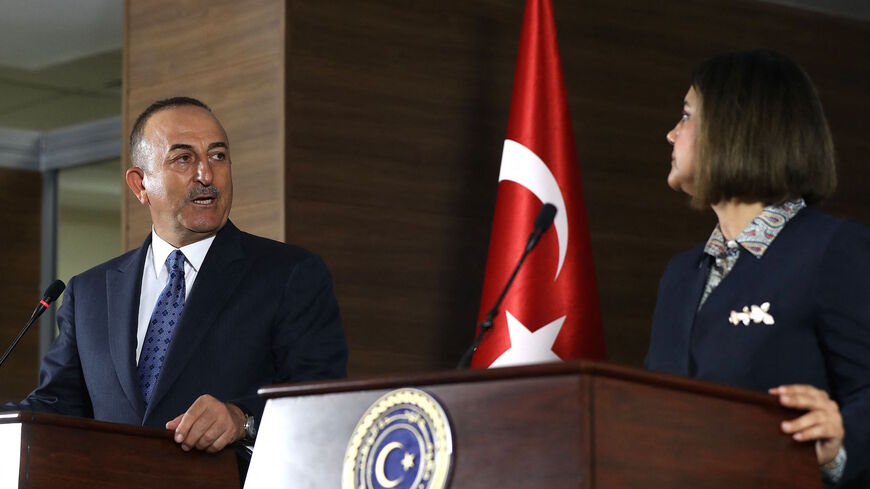(R to L) Libya's Foreign Minister Najla al-Mangoush and Turkish counterpart Mevlut Cavusoglu give a joint press conference in the capital Tripoli on May 3, 2021.