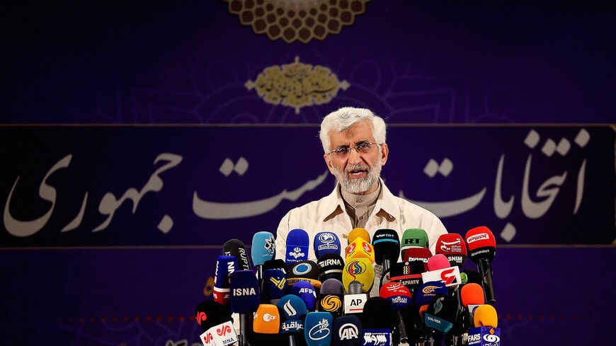 Iran's former top nuclear negotiator and former presidential candidate Saeed Jalili talks to the media after registering his candidacy for the June presidential elections, at the Interior Ministry in the capital Tehran, on May 15, 2021. 