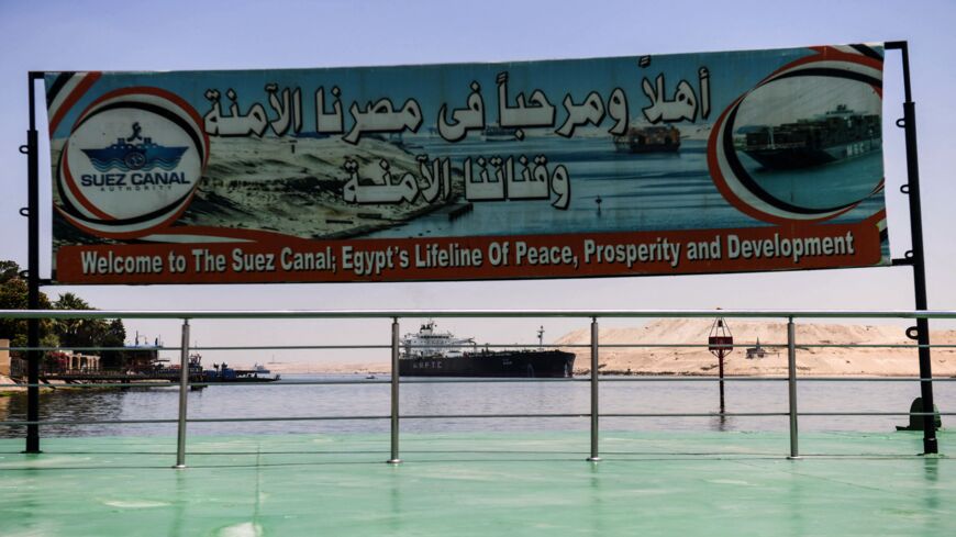 A welcome sign on the Suez Canal shore in the northeastern Egyptian city of Ismailiya, on May 27, 2021. 