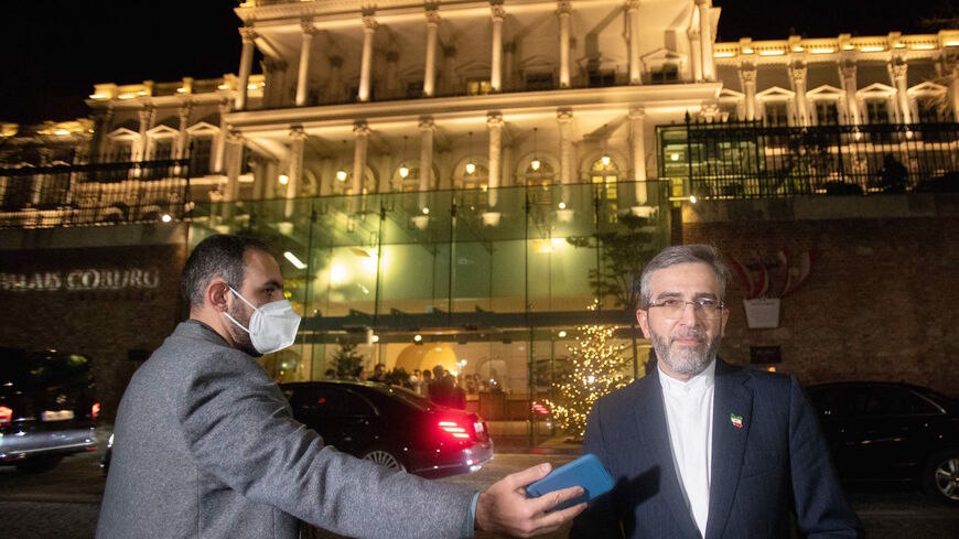 Iran's chief nuclear negotiator Ali Bagheri Kani speaks to the press in front of the Palais Coburg, venue of the Joint Comprehensive Plan of Action (JCPOA) meeting that aims at reviving the Iran nuclear deal, in Vienna on Dec. 27, 2021. 