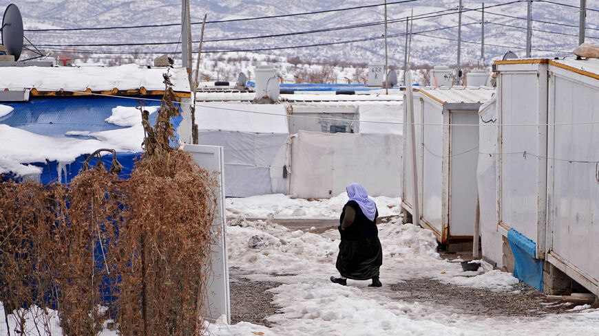 A picture shows a snow-covered displacement camp for Yazidis in the area of Dawudya, about 60 kilometers (37 miles) north of Dahuk, Iraqi Kurdistan, Jan. 25, 2022.