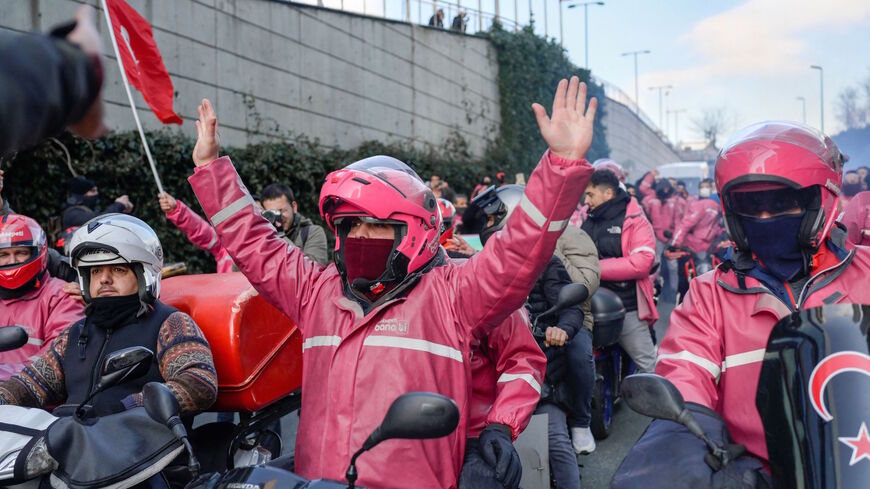 Delivery couriers of Yemeksepeti demonstrate to demand higher wages in front of the company's headquarters in Istanbul, on Feb. 5, 2022. 