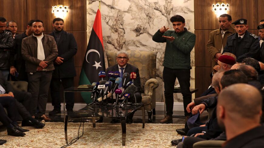 Libyan interim Prime Minister Fathi Bashagha delivers a speech at Mitiga International Airport in Tripoli on Feb. 10, 2022. 