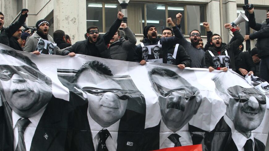 Supporters and parliamentarians of Republican People's Party demonstrate against corruption and bribery on Dec. 17, 2014, in Ankara.