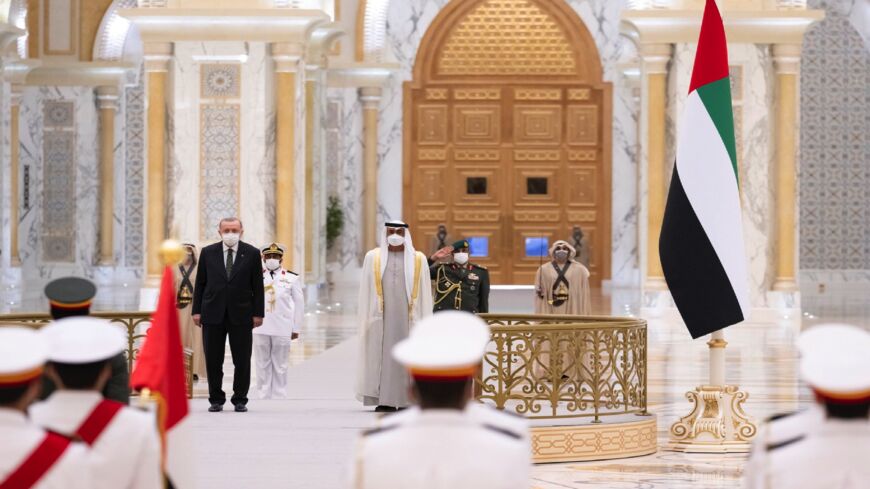Turkish President Recep Tayyip Erdogan is received by Abu Dhabi Crown Prince Mohammed bin Zayed Al Nahyan, Feb. 14, 2022, in the UAE.