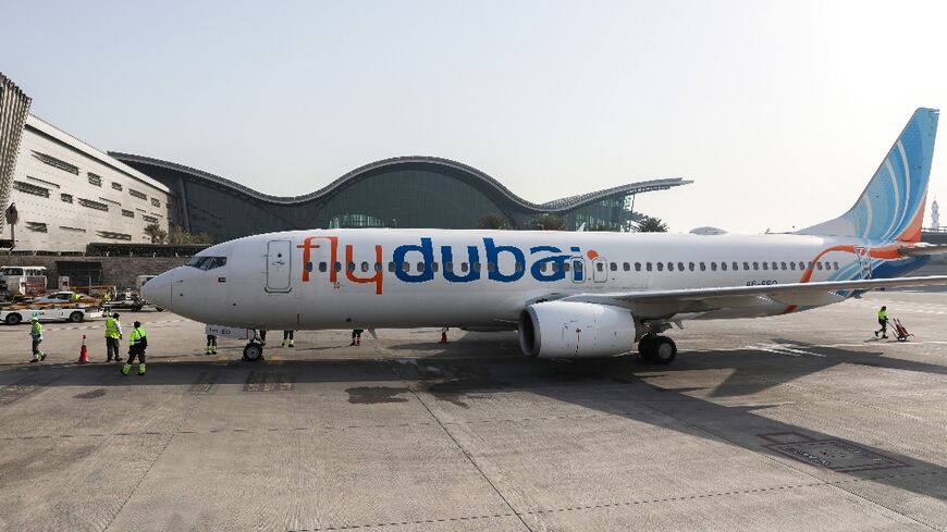A handout photo provided by Hamad International Airport shows a flydubai airplane on January 26, 2021