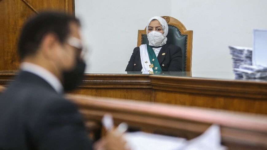Egyptian female judge Radwa Helmi sits on her first court hearing at the State Council in the capital Cairo