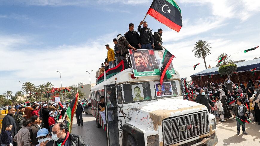 A parade to commemorate the 2011 uprising that toppled Libyan strongman Moamer Kadhafi, in the coastal city of Tajura, east of the capital Tripoli, on February 25, 2022