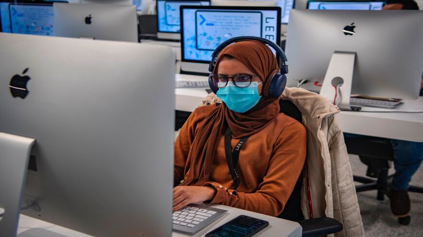 A student uses a computer in a lab room at the IT training center in Morocco's central city of Khouribga on Nov. 17, 2020.