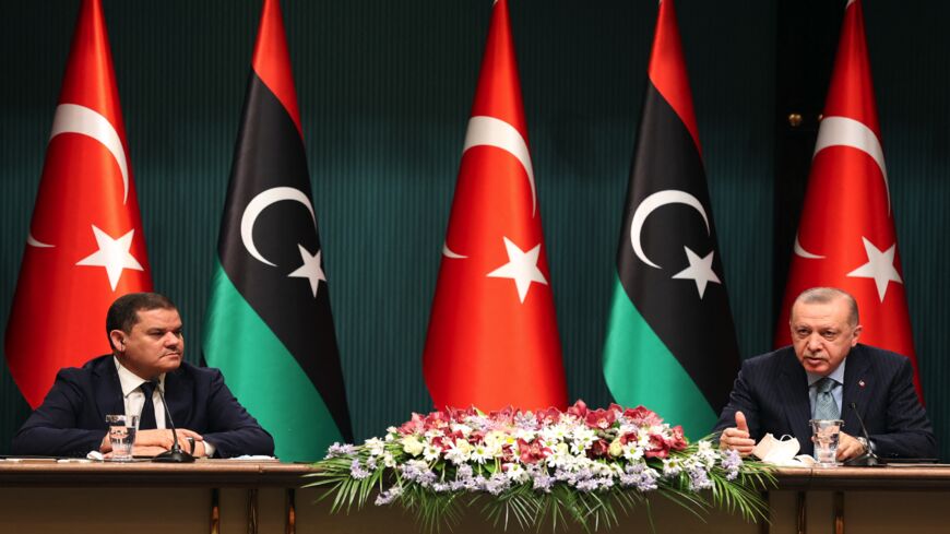 Turkish President Recep Tayyip Erdogan (R) and Libyan GNU Prime Minister Abdul Hamid Dbeibah.