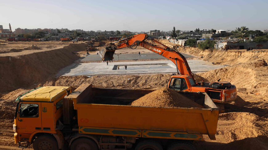 Egyptian machinery work at the construction site of a new housing complex north of Gaza City, Gaza Strip, Jan. 11, 2022.