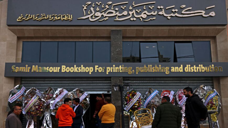 orkers prepare for the opening of the new Samir Mansour bookshop.