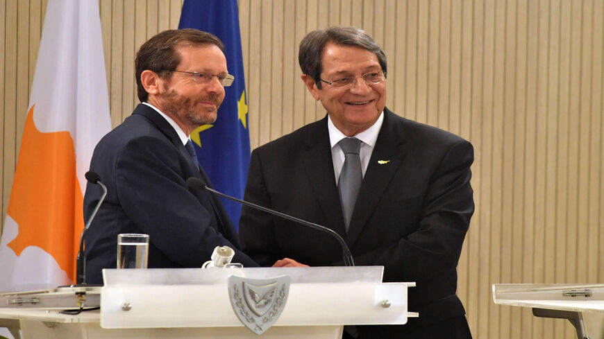 Cypriot President Nicos Anastasiades (R) and Israeli President Isaac Herzog give a joint press conference during an official visit by the latter, Nicosia, Cyprus, March 2, 2022.