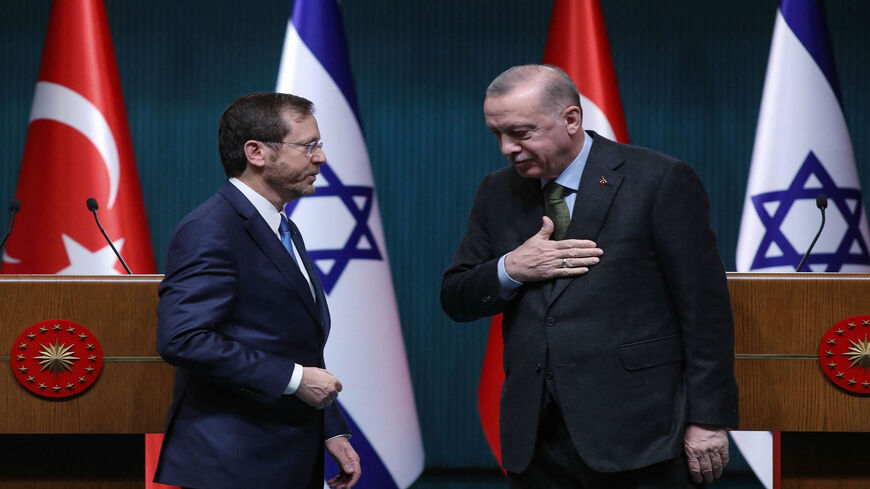 Israeli President Isaac Herzog (L) stands next to his Turkish counterpart, Recep Tayyip Erdogan, after a press conference, Ankara, Turkey, March 9, 2022.