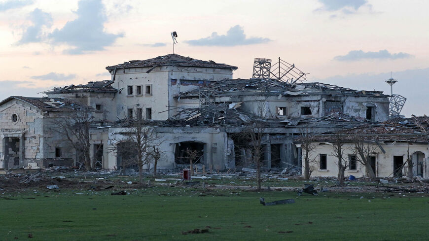 A general view shows a damaged mansion following an overnight attack in Erbil, the capital of the northern Iraqi Kurdish autonomous region, March 13, 2022.