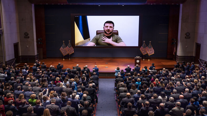 Ukrainian President Volodymyr Zelenskyy speaks to the US Congress by video to plead for support as his country is besieged by Russian forces, at the US Capitol, Washington, March 16, 2022.