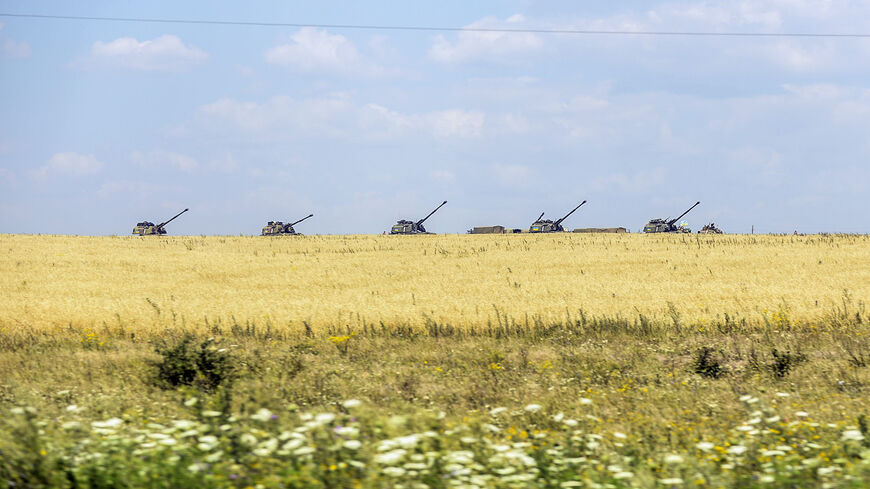 Ukrainian tanks stand guard near a field in the village of Debaltseve, in the Donetsk region, eastern Ukraine, July 31, 2014.