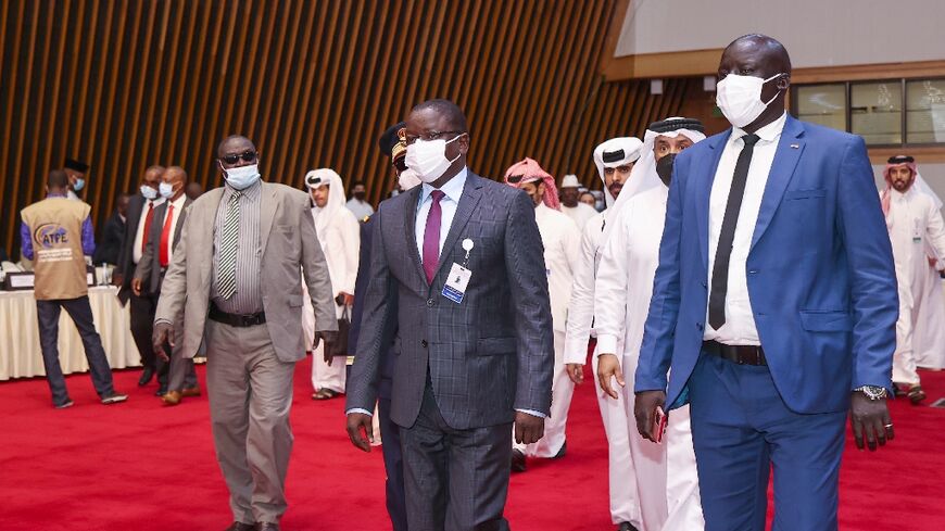 Chad's Prime Minister Albert Pahimi Padacke arrives at the start of peace talks in Doha on Sunday
