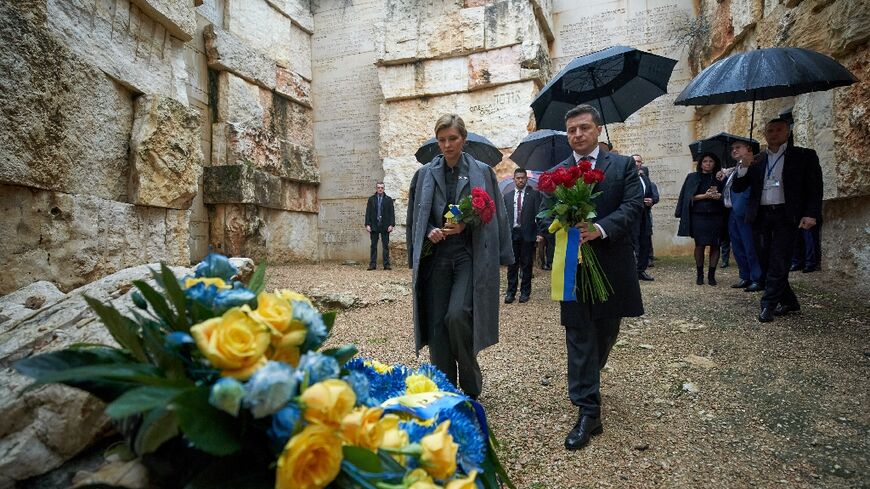 This handout picture shows Ukrainian President Volodymyr Zelenski and his wife Olena visiting the Holocaust memorial complex in Jerusalem in January 2020 during an official visit to Israel
